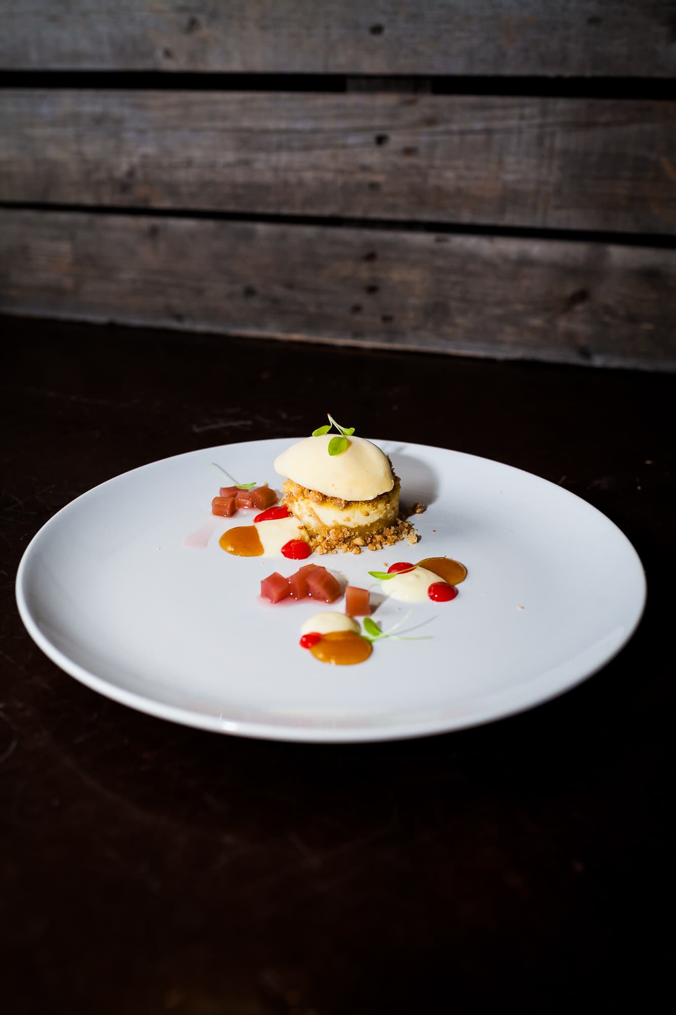 plated cheesecake with crumble